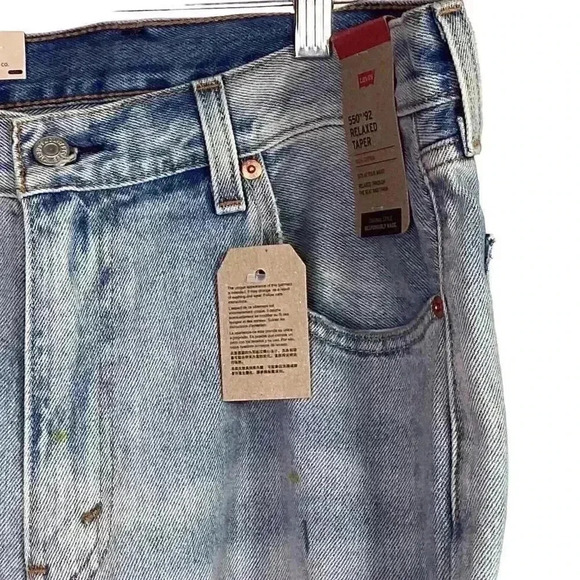 Levi's 550 '92 0002 Stained Distressed 34X34 Relaxed Taper Leg Light Jeans NWT - Picture 3 of 12